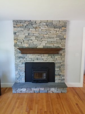 Stone Fireplace - our client was looking to update their Common area to add more value and appeal to the home. The outcome was something everyone was very happy with, and gave the family a beautiful center piece for friends and family to gather around.