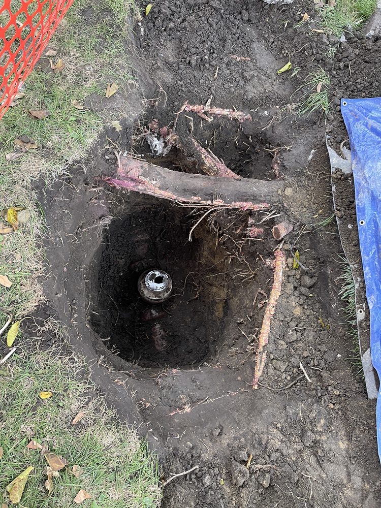 Slide of Benchmark Plumbing & Rodding