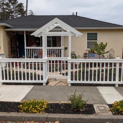 Streamline Landscape - After shot showing the fence and arbor.