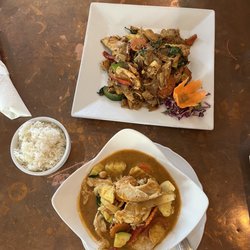 Thai Cuisine - Massaman curry (bottom) and drunken noodle with chicken (top)