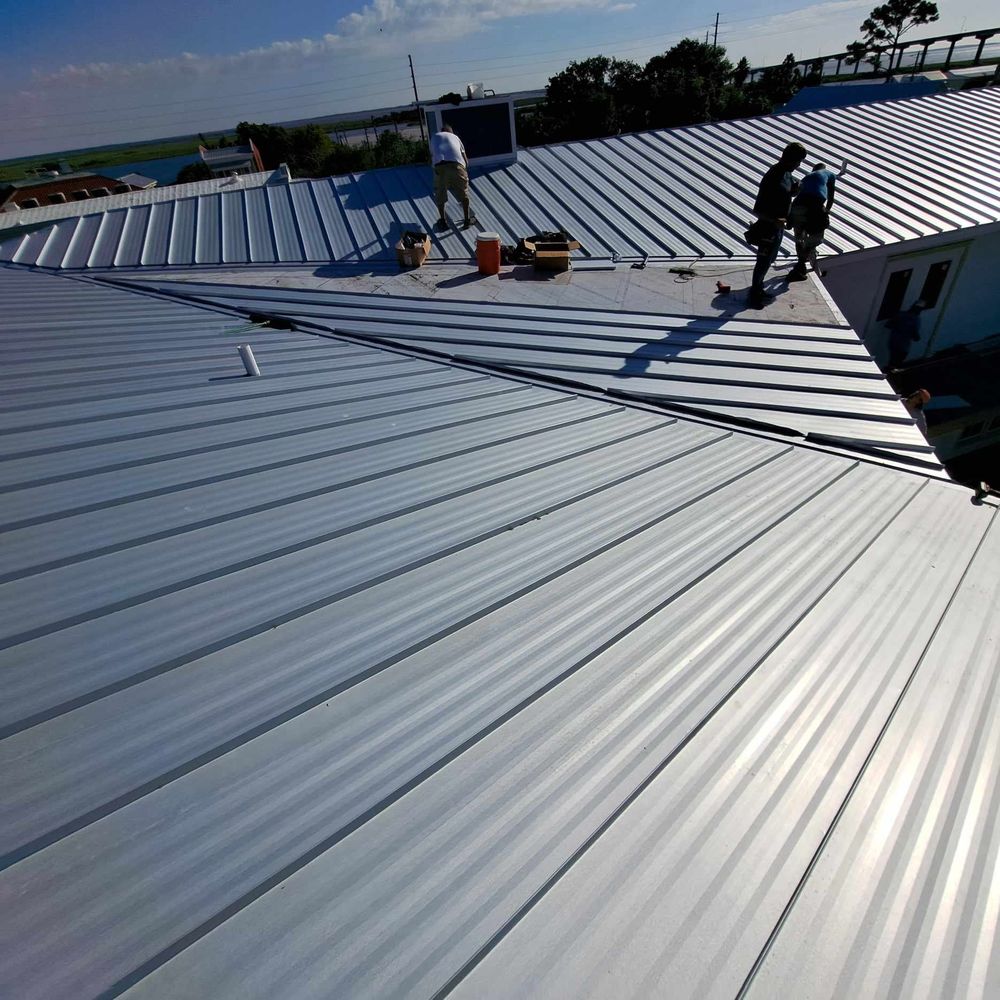 Slide of E-Squared Roofing