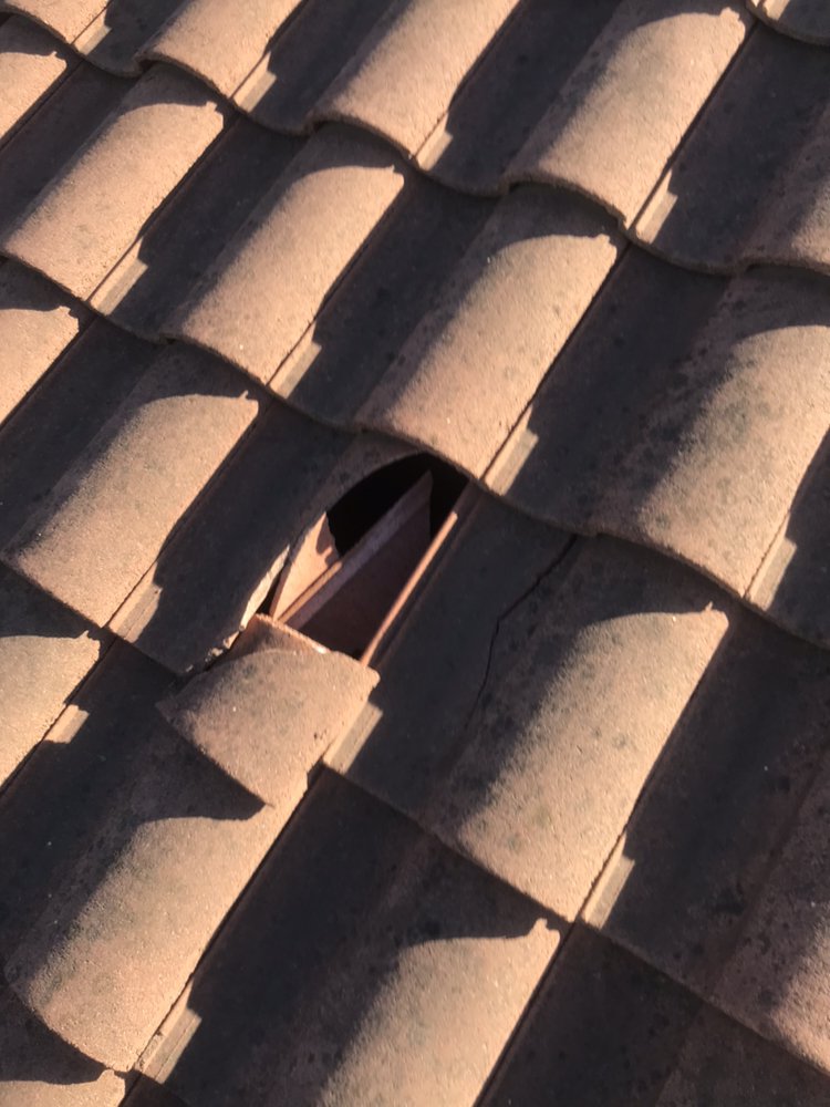 Slide of Century Roofing Company