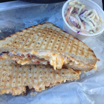 Parker & Otis - Pimento Cheese Sandwich with bacon on sourdough bread with their cole slaw that comes on the side. - Specialty Food Near Me - Durham, North Carolina Parker & Otis - Pimento Cheese Sandwich with bacon on sourdough bread with their cole slaw that comes on the side. - Specialty Food Near Me - Durham, North Carolina