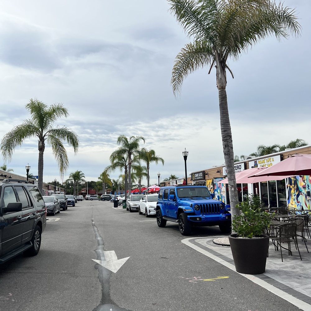 Krate At The Grove - a street lined with parked cars - Food Court Near Me - Wesley Chapel, Florida Krate At The Grove - a street lined with parked cars - Food Court Near Me - Wesley Chapel, Florida