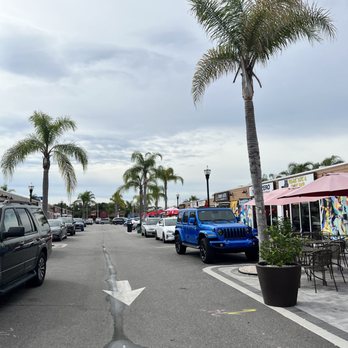 Krate At The Grove - a street lined with parked cars - Food Court Near Me - Wesley Chapel, Florida