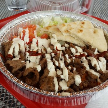 The Halal Guys - Beef platter with white and red sauce. Don't overdo it on the red or you'll be sorry. - Halal Near Me - Chamblee, Georgia