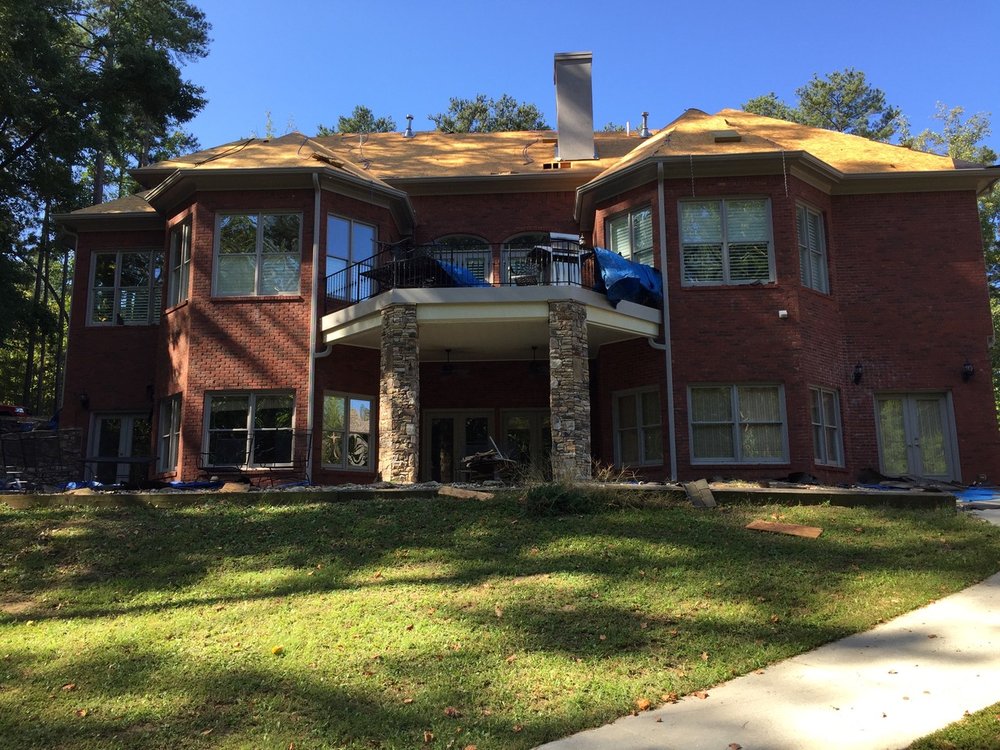 Slide of Grove Roofing