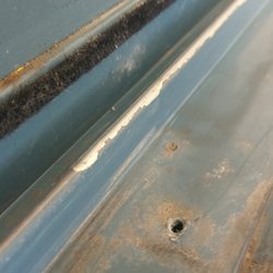 Wizard Sliding Door Repairs - Old worn out track.