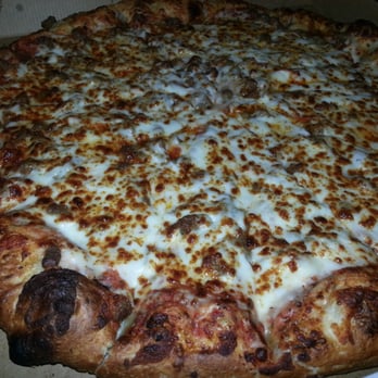 King's Pizza & Pasta - Beef, pepperoni, extra cheese.  They put their toppings underneath the cheese. - Pizza Near Me - Houston, Texas