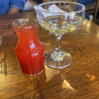 Merchant & Main Grill & Bar - Champagne and strawberry juice - Bars Near Me - Vacaville, California Merchant & Main Grill & Bar - Champagne and strawberry juice - Bars Near Me - Vacaville, California