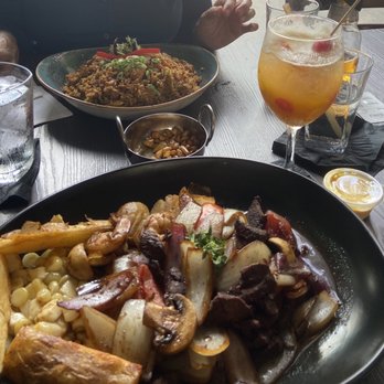 CVI.CHE 105 - Iron man, Arroz Chaufa de Mariscos, and Sangria - Peruvian Near Me - Miami, Florida CVI.CHE 105 - Iron man, Arroz Chaufa de Mariscos, and Sangria - Peruvian Near Me - Miami, Florida