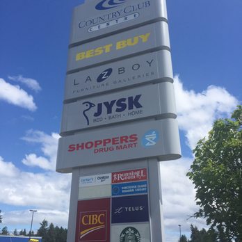 Country Club Centre - Road sign of stores in the centre - Shopping Centers Near Me - Nanaimo, British Columbia
