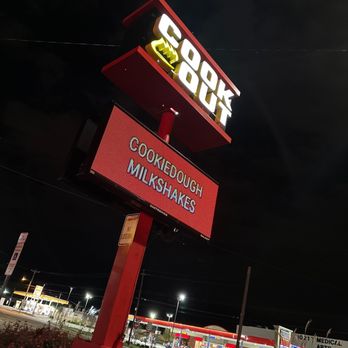 Cook Out - a neon sign for a restaurant - Hot Dogs Near Me - Greensboro, North Carolina Cook Out - a neon sign for a restaurant - Hot Dogs Near Me - Greensboro, North Carolina