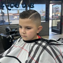 Mid fade combover with a part line