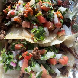 Carne asada tacos with pico de gallo