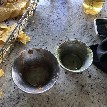 Topgolf - We ordered Chips & Guac that's literally what the appetizer is called. The guac container is on the right and the salsa is on the left. - Golf Near Me - Scottsdale, Arizona