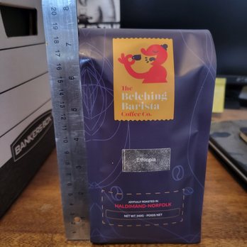 Belching Barista - a bag of coffee on a table - Desserts Near Me - Waterford, Ontario Belching Barista - a bag of coffee on a table - Desserts Near Me - Waterford, Ontario