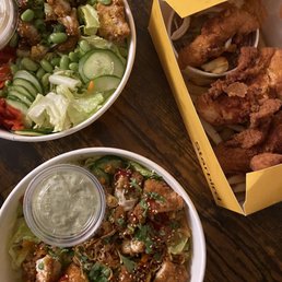 three bowls of food on a table three bowls of food on a table