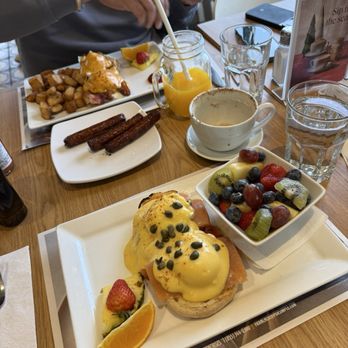 Pur & Simple - Eggs Benedict with smoked salmon and side of fruits. Hubby got a Benny too with spicy hollandaise - yum! - Breakfast & Brunch Near Me - Mississauga, Ontario Pur & Simple - Eggs Benedict with smoked salmon and side of fruits. Hubby got a Benny too with spicy hollandaise - yum! - Breakfast & Brunch Near Me - Mississauga, Ontario