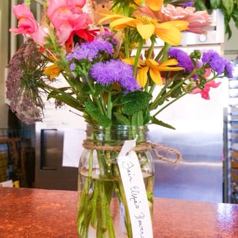 Me Oh My Pie - Flowers arrangements by local grower, Fair Eliza, adorn each counter inside the shop. - Cafes Near Me - Laporte, Colorado Me Oh My Pie - Flowers arrangements by local grower, Fair Eliza, adorn each counter inside the shop. - Cafes Near Me - Laporte, Colorado
