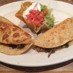Zapatas Grill Mexican Restaurant - Mushroom quesadillas with a guacamole salad. Nice presentation.