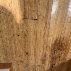 Allbrands Appliance Service - damaged floor and trim from leaking washer