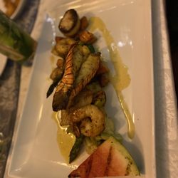Abacus - Mixed Grille - Grilled local fish, lobster tail & scallop with a shrimp, Roast potato, garden vegetable, grilled watermelon