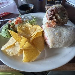 La Fogata Bar & Grill - Chicken burrito with avocado and sour cream on the side