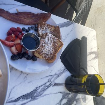 Pi Social - French toast with huge bacon and fresh fruit - Pizza Near Me - Fredericksburg, Texas Pi Social - French toast with huge bacon and fresh fruit - Pizza Near Me - Fredericksburg, Texas