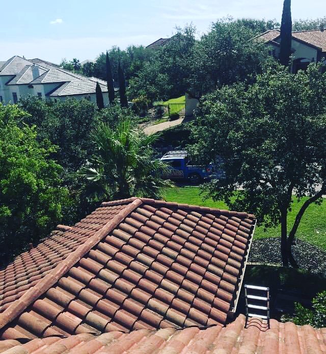 Slide of Roland's Roofing