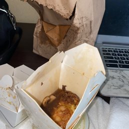Egg foo young in a paper container
