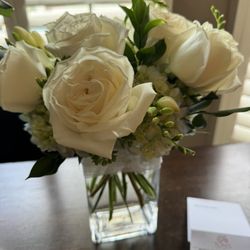Toni's Flowers & Gifts - Pretty but not what i requested. 5 roses really. I even paid for enhancements & told her how special the family is.