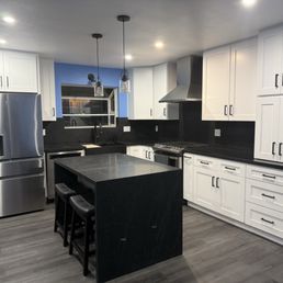 Kitchen remodel. Removed wing wall with small oven and counter pier to open up and add the island. Kitchen remodel. Removed wing wall with small oven and counter pier to open up and add the island.