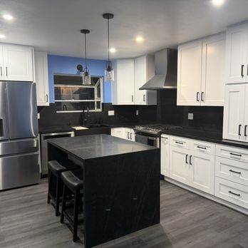 Orange Home Builders - Kitchen remodel. Removed wing wall with small oven and counter pier to open up and add the island. - General Contractors Near Me - Newport Beach, California Orange Home Builders - Kitchen remodel. Removed wing wall with small oven and counter pier to open up and add the island. - General Contractors Near Me - Newport Beach, California