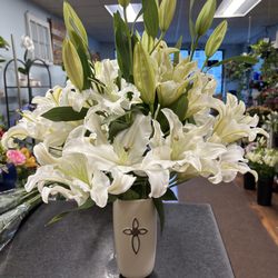 Coady Florist - Faithful Blessings White Lily Cross Vase Deluxe headed to Brighton to honor a loved one.