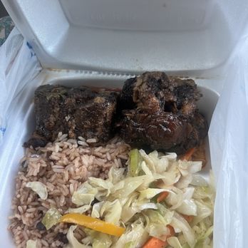 Iwayne's Caribbean Kitchen - Oxtails includes rice & cabbage - Caribbean Near Me - Austin, Texas