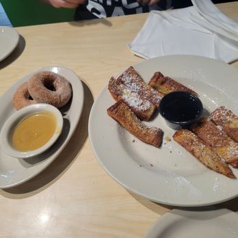 The Toasted Yolk Cafe - French toast sticks and the churro donuts with caramel sauce - Breakfast & Brunch Near Me - Mont Belvieu, Texas The Toasted Yolk Cafe - French toast sticks and the churro donuts with caramel sauce - Breakfast & Brunch Near Me - Mont Belvieu, Texas