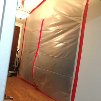 Andalusian Builders - MH -During Demo, they tape off work to help decrease dust debris into other rooms - General Contractors Near Me - Morgan Hill, California