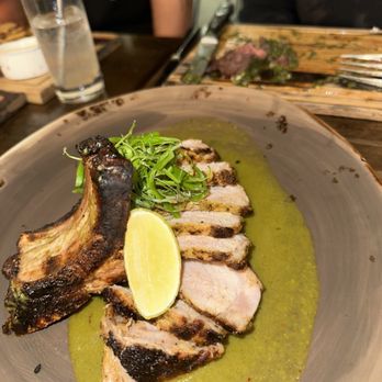 Lucina Eatery & Bar - Pork chop - Latin American Near Me - Denver, Colorado Lucina Eatery & Bar - Pork chop - Latin American Near Me - Denver, Colorado
