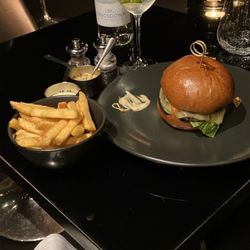Gaucho - The classic burger with cheese, chips, and watermelon Americano.