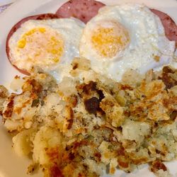 2 eggs over easy with Canadian Bacon