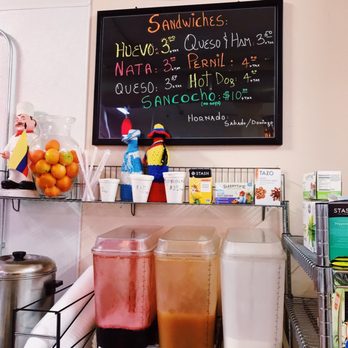 Panaderia Ecuatoriana - a menu on the wall - Latin American Near Me - Minneapolis, Minnesota