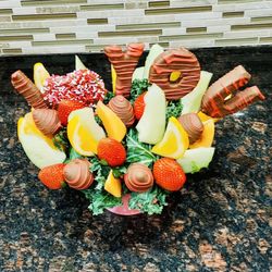 Manny's Sweet Treats - An edible arrangement of covered fruit with chocolate  and its delicious and different!
