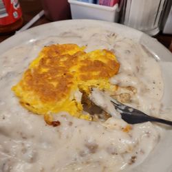 Crazy Joe's Diner - Biscuits and gravy with two eggs on top! Yummy! Unending coffe and lemon water