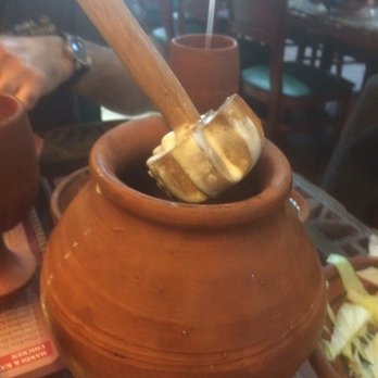 Clay Handi - Half pot of lassi(sweet) served in clay pot and wooden mixer. Fantastic and super cool!! - Halal Near Me - Buffalo, New York Clay Handi - Half pot of lassi(sweet) served in clay pot and wooden mixer. Fantastic and super cool!! - Halal Near Me - Buffalo, New York