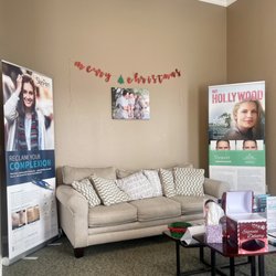 Prestige Dermatology Of Alliance - Waiting area. Photo of Dr Pham and his family