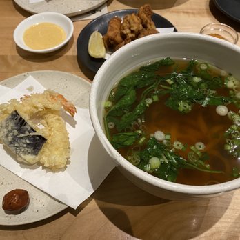 Raku - Ebiten udon (comes with two shrimp tempura, one eggplant tempura and a pickled plum). - Japanese Near Me - Toronto, Ontario Raku - Ebiten udon (comes with two shrimp tempura, one eggplant tempura and a pickled plum). - Japanese Near Me - Toronto, Ontario