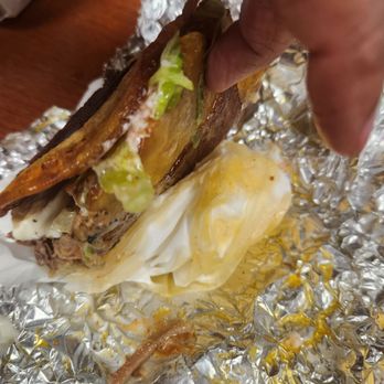 Doña Maria Restaurant - Very oily...leaked through the foil and take out bag onto car seat , but cannot deny the flavor. DELICIOUS - Venezuelan Near Me - Humble, Texas