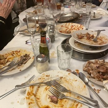 Mosca's Restaurant - a table full of dirty dishes - Cajun/Creole Near Me - Westwego, Louisiana
