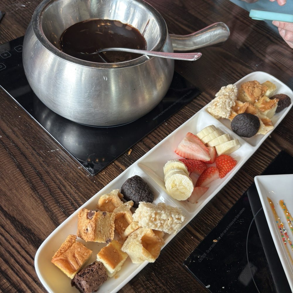 Melting Pot - New Haven - Pure Milk Chocolate Fondue - Desserts Near Me - New Haven, Connecticut Melting Pot - New Haven - Pure Milk Chocolate Fondue - Desserts Near Me - New Haven, Connecticut